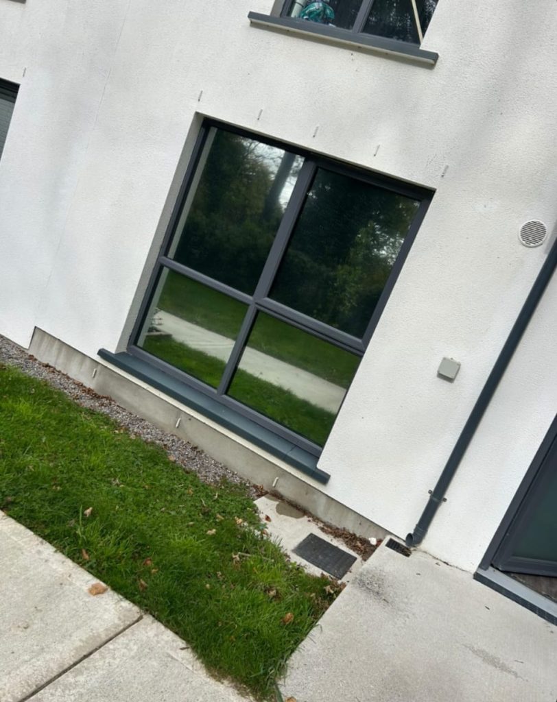 Outdoor view of newly tinted residential windows